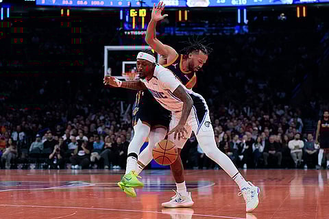 NBA Cup 2024: Magic guard Kentavious Caldwell-Pope and Knicks guard Jalen Brunson collide