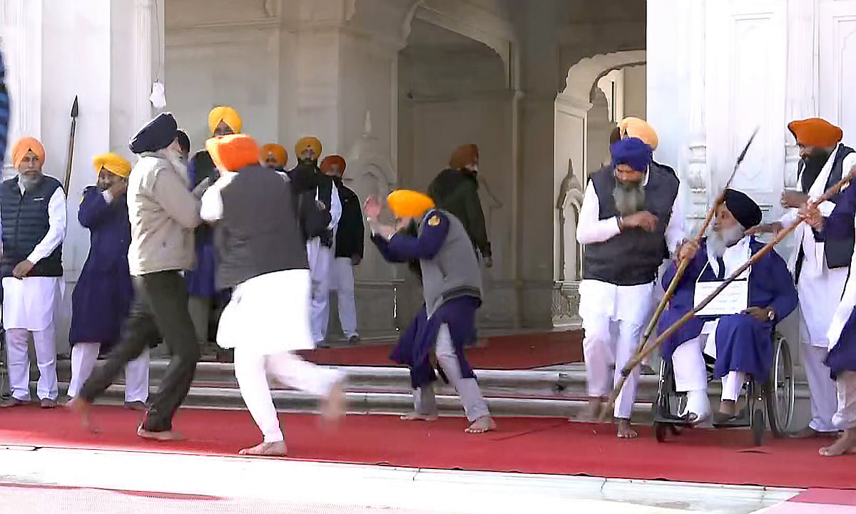 PTI :  People catch a man who allegedly opened fire at Shiromani Akali Dal leader Sukhbir Singh Badal while the latter was serving the 'tankhah' (religious punishment) given by the Akal Takht at the Golden Temple, in Amritsar, Wednesday, Dec. 4, 2024. 