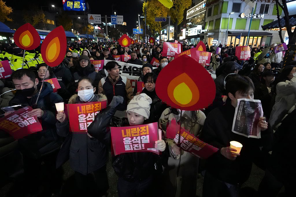 | Photo: AP : Public protests against martial law