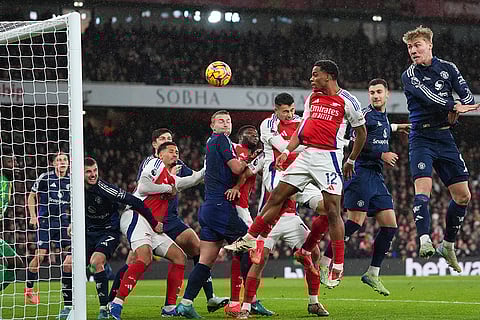 EPL 2024-25: Arsenal's Jurrien Timber, center right, heads the ball to score his side's first goal