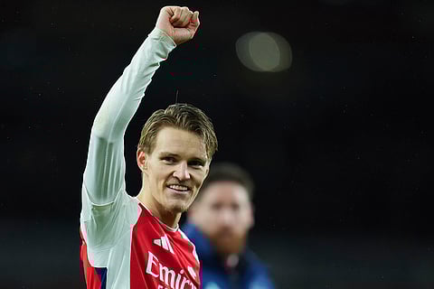 EPL 2024-25: Arsenal's Martin Odegaard celebrates at the end of the match