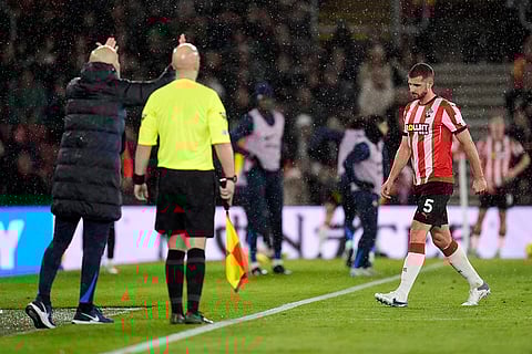 EPL 2024-25: Southampton's Jack Stephens leaves the pitch after being shown a red card