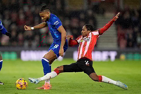 EPL 2024-25: Chelsea's Christopher Nkunku, left, and Southampton's Kyle Walker-Peters battle for the ball