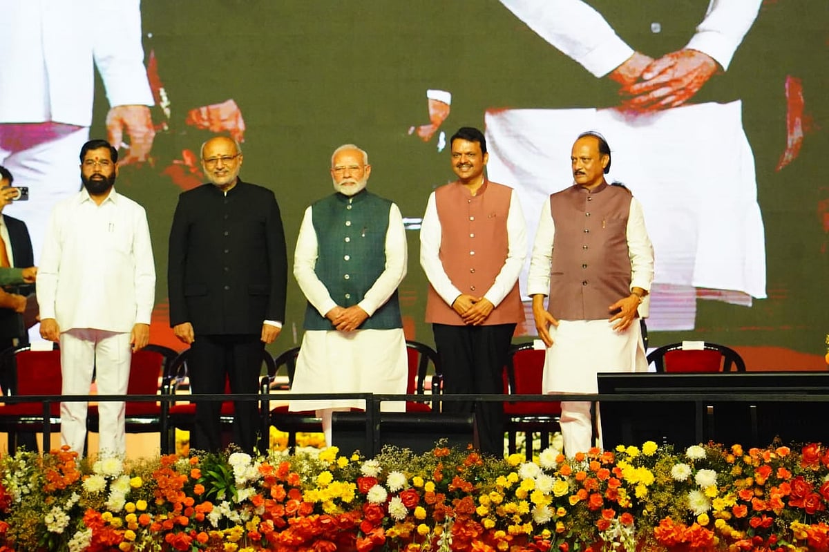 Outlook Photo : Maharashtra's new chief minister Devendra Fadnavis with PM Modi and his two Deputy CMs