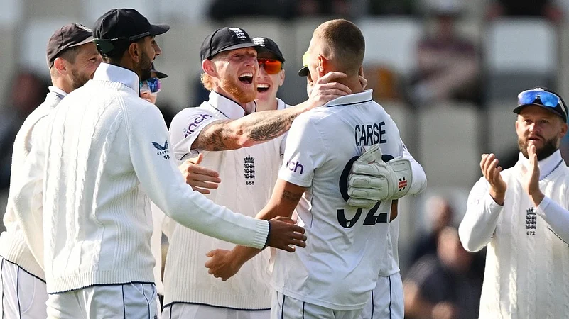 England celebrate the wicket of New Zealand batter Kane Williamson