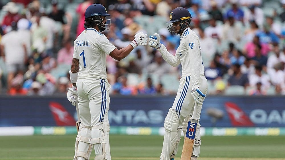 | Photo: AP/James Elsby : IND Vs AUS 2nd Test Day 1: India's Shubman Gill, right, and KL Rahul celebrate scoring runs