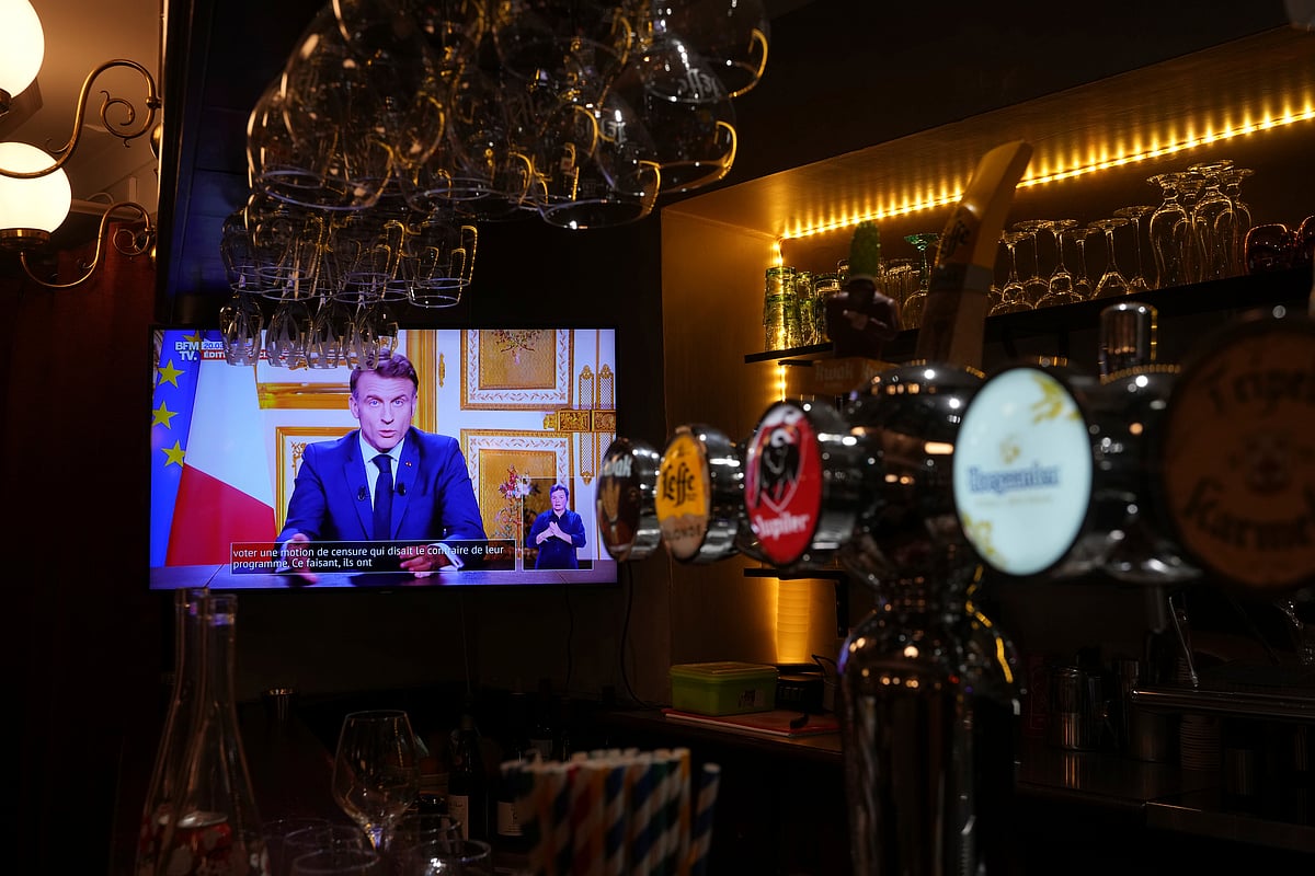 AP Photo/Michel Euler : French President Emmanuel Macron addresses the nation following the resignation of ousted Prime Minister Michel Barnier, a day after a historic no-confidence vote at the National Assembly left France without a functioning government. Thursday, Dec. 5, 2024 in Versailles, outside Paris. 