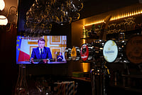 AP Photo/Michel Euler : The votes followed the government’s decision to invoke Article 49.3 of the constitution, which allows legislation to be adopted without a parliamentary vote unless lawmakers successfully bring down the government through a no-confidence motion. 