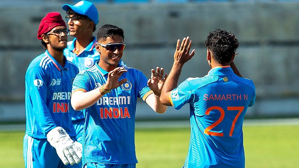 Asia Cup U-19 IND vs PAK: India's Samarth Nagaraj, right, celebrates the wicket of Pakistan's Shahzaib Khan  - | Photo: AP/Ahmed Ramzan