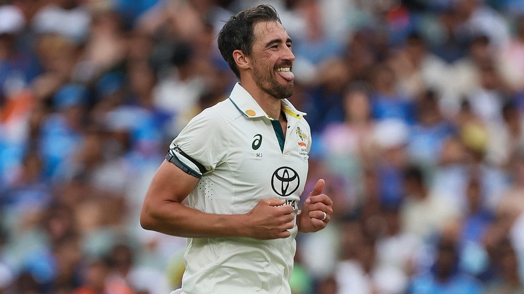 Mitchell Starc celebrates the wicket of Harshit Rana