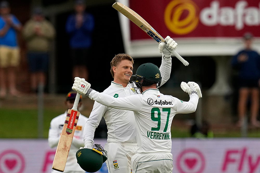 | Photo: AP/Themba Hadebe : RSA Vs SL, 2nd Test Day 1: South Africa's Ryan Rickelton celebrates with Kyle Verreynne, after reaching his century