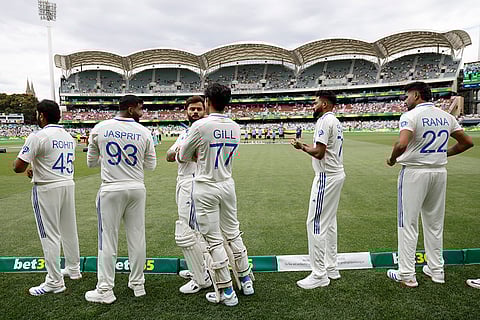 IND Vs AUS 2nd Test Day 1: India's Virat Kohli, third left, and teammates wait to walk into the field