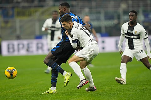 Italy Serie A 2024-25: Parma's Enrico Del Prato, right, and Inter Milan's Marcus Thuram vie for the ball
