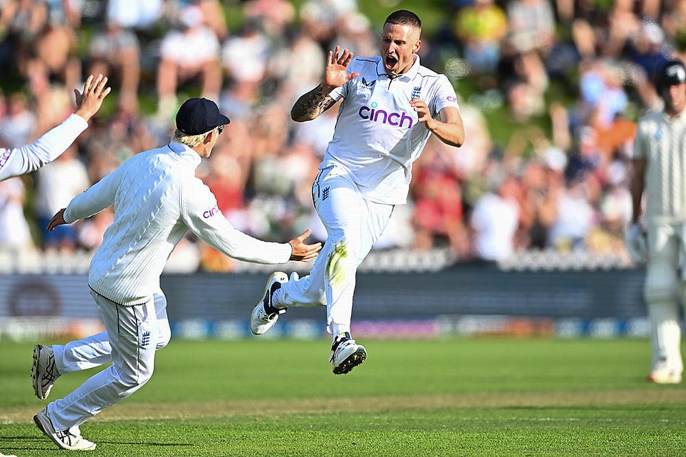 | Photo: Kerry Marshall/Photosport via AP : NZ vs Eng 2nd Test Day 1: England's Brydon Carse celebrates the wicket of New Zealand's Daryl Mitchell 