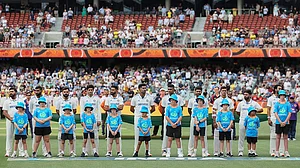 | Photo: AP/James Elsby : IND Vs AUS 2nd Test Day 1: Indian players stand for their national anthem