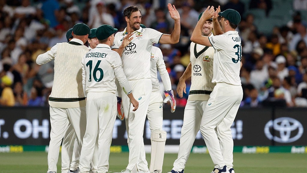 AP/James Elsby : Australia celebrate the wicket of Shubman Gill on Day 2 of the second Test against India in Adelaide.