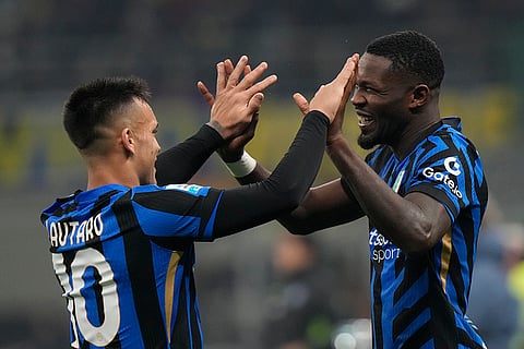 Italy Serie A 2024-25: Inter Milan's Marcus Thuram celebrates with Inter Milan's Lautaro Martinez after scoring