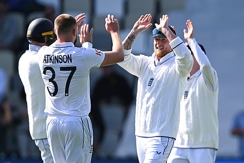 NZ vs Eng 2nd Test Day 1: England's Ben Stokes congratulates teammate Gus Atkinson after taking the wicket of New Zealand's Devon Conway