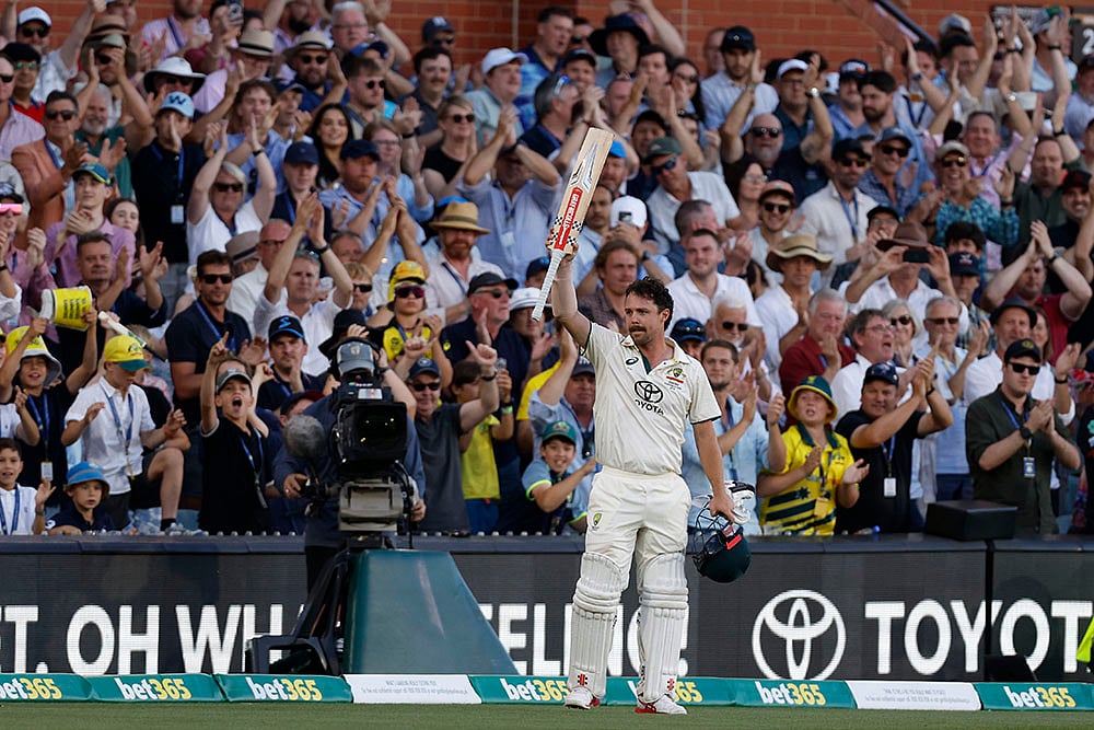 | Photo: AP/James Elsby : IND Vs AUS 2nd Test Day 2: Australia's Travis Head acknowledges the applause from the crowd