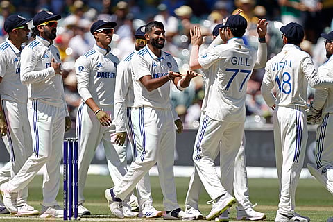 IND Vs AUS 2nd Test Day 2: India's Jasprit Bumrah, center, celebrates with teammates after the dismissal of Australia's Steve Smith