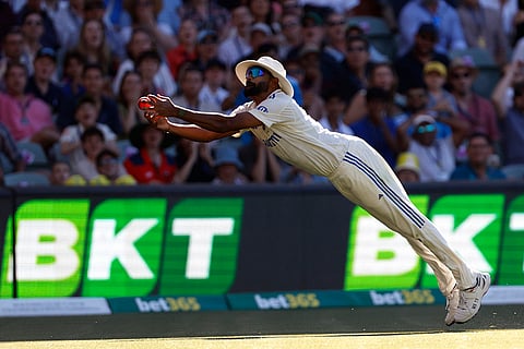 IND Vs AUS 2nd Test Day 2: India's Mohammed Siraj makes an unsuccessful attempt to take the catch after a shot played by Travis Head