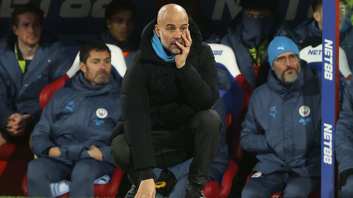 Manchester City boss Pep Guardiola watches on at Selhurst Park - null
