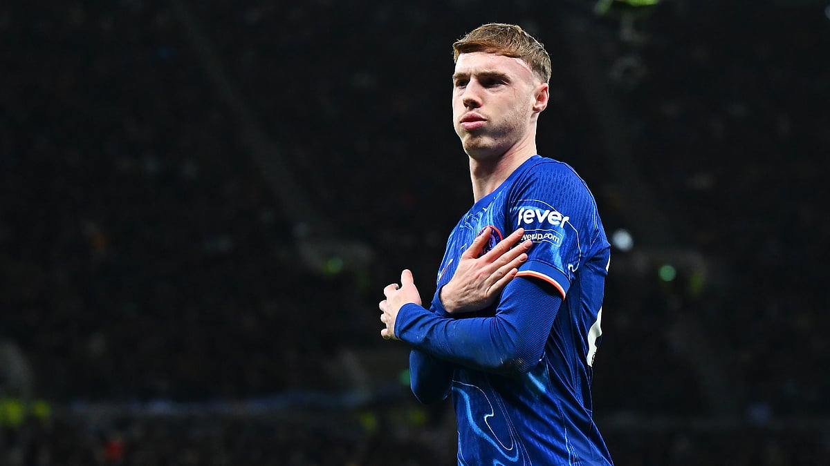 Cole Palmer celebrates his second penalty against Tottenham on Sunday - null