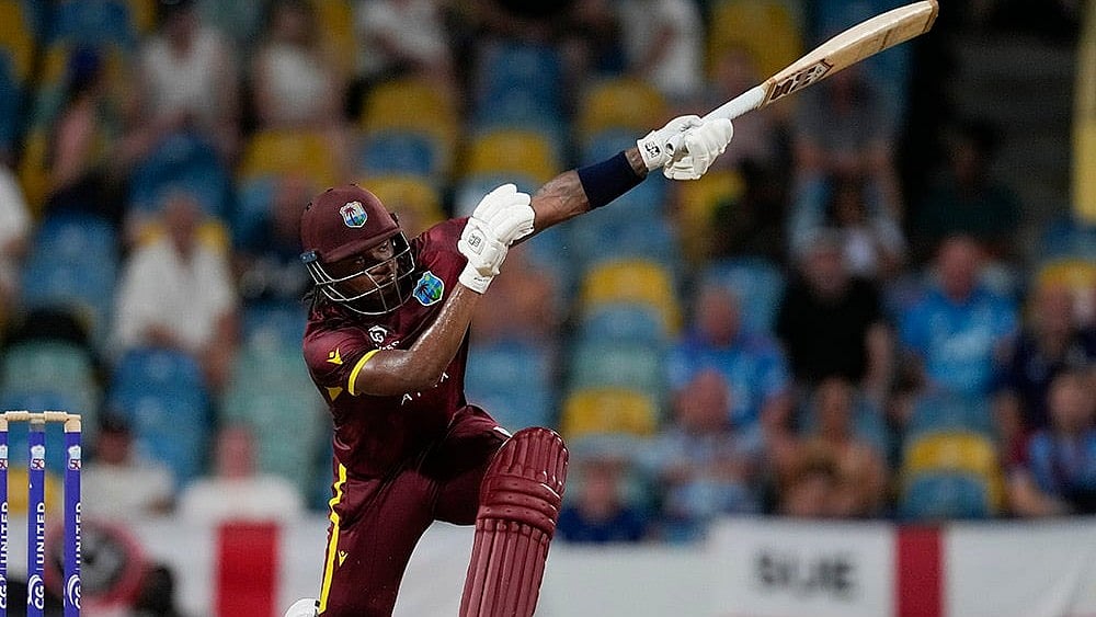 | Photo: AP/Ricardo Mazalan :  West Indies' Keacy Carty plays a shot