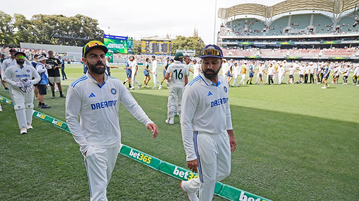 Indias captain Rohit Sharma with Virat Kohli. AP Photo.