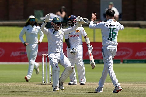 RSA Vs SL, 2nd Test: South Africa's Kyle Verreynne, center, congratulates teammate South Africa's Keshav Maharaj