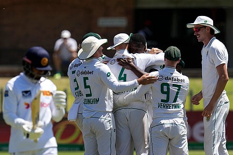RSA Vs SL, 2nd Test: South Africa's Kagiso Rabada celebrates with his teammates after dismissing Sri Lanka's captain Dhananjaya de Silva