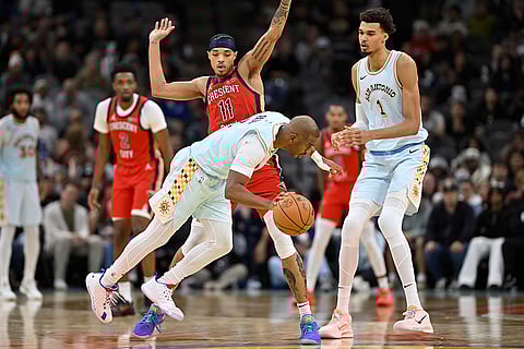 NBA Pelicans vs Spurs Basketball: Spurs' Chris Paul and Victor Wembanyama, front left, tangles with Pelicans' Brandon Boston