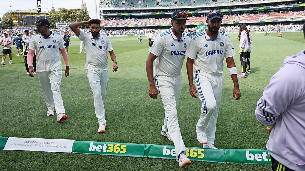 Indian players leave the field after their loss in the second Test against Australia at the Adelaide Oval.  - AP/James Elsby