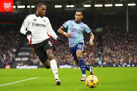 EPL 2024-25, FUL vs ARS: Fulham's Issa Diop, left, challenges for the ball with Arsenal's Jurrien Timber