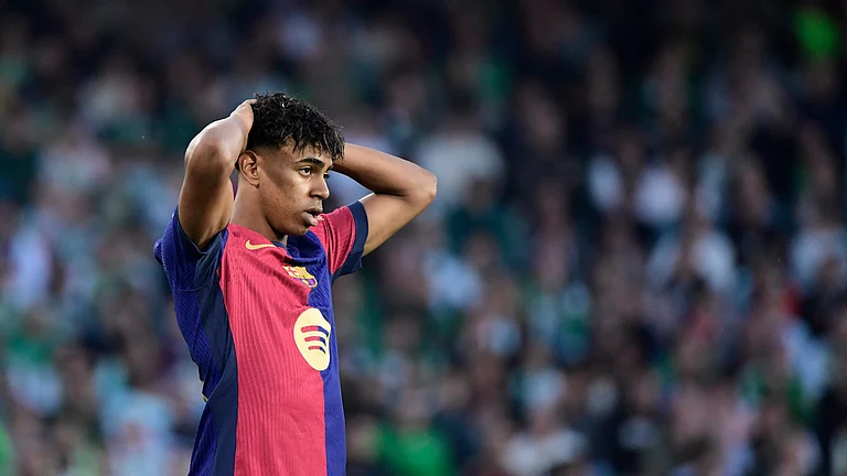 Lamine Yamal looks dejected during Barcelona's draw with Real Betis - null