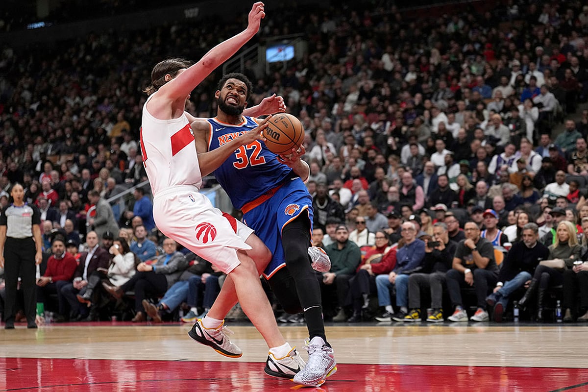 NBA New York Knicks vs Toronto Raptors basketball game photos: Karl-Anthony Towns