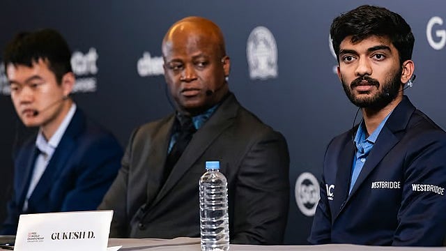 FIDE/Eng Chin An via PTI : India's D Gukesh and China’s Ding Liren during the press conference after the 12th game of the FIDE World Chess Championship 2024 in Singapore.