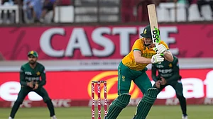 AP/ Themba Hadebe : South Africa's David Miller bats during the first T20 cricket match between South Africa and Pakistan at the Kingsmead stadium in Durban, South Africa, Tuesday, Dec. 10, 2024.
