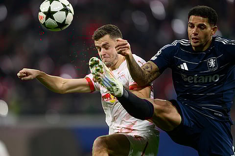 Champions League 2024-25: Leipzig's Christoph Baumgartner and Aston Villa's Diego Carlos battle for the ball