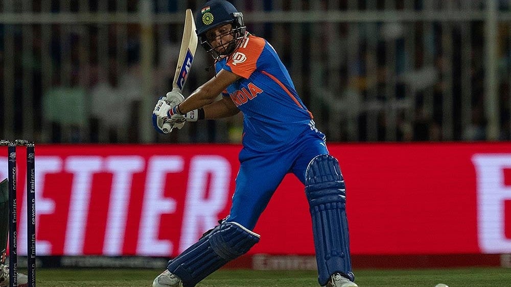 Photo: AP/Altaf Qadri : IND-W skipper Harmanpreet Kaur in white-ball action.