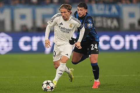 Champions League 2024-25: Real Madrid's Luka Modric, left, and Atalanta's Lazar Samardzic fight for the ball