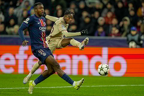 Champions League 2024-25: Salzburg's Dorgeles Nene and PSG's Willian Pacho vie for the ball