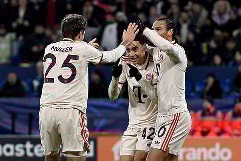 Champions League 2024-25: Bayern's Thomas Muller, left, celebrates after scoring his side's second goal