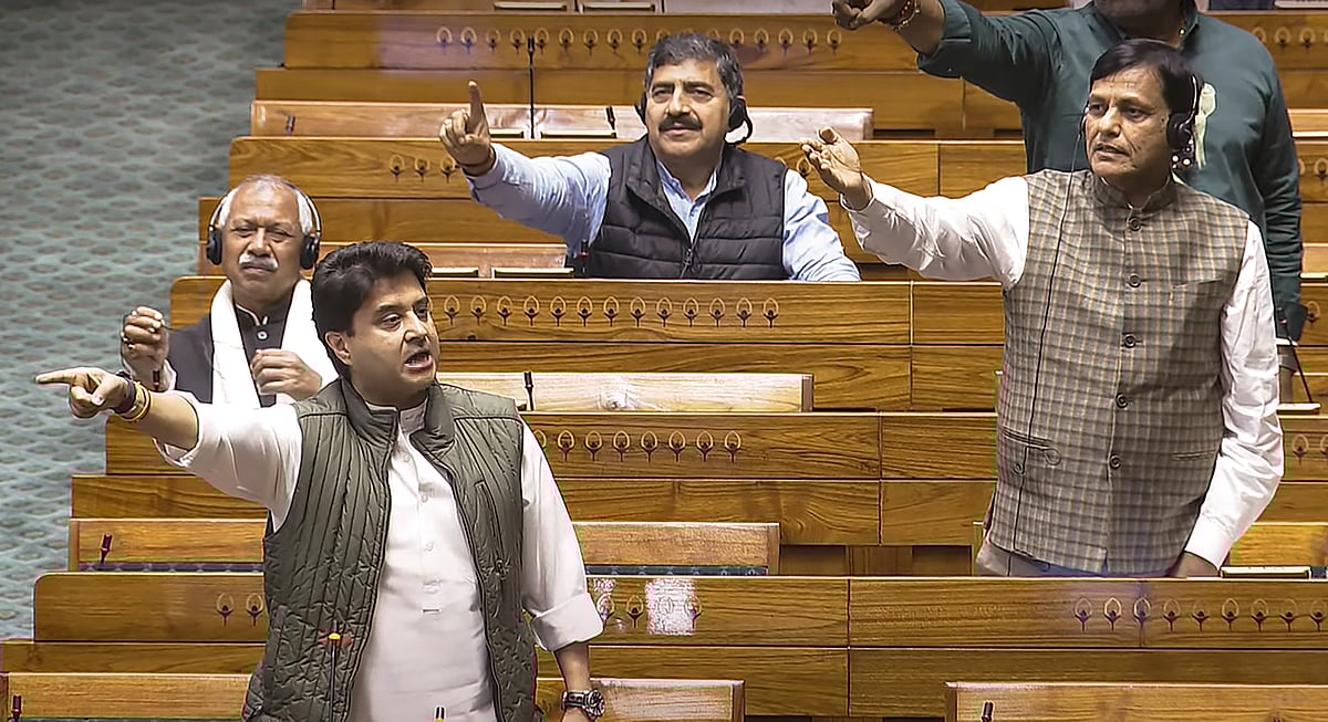 PTI : Union Minister of Communications Jyotiraditya Scindia and Union Minister of State for Home Affairs Nityanand Rai react amid TMC MP Kalyan Banerjee's speech in the Lok Sabha during the Winter session of Parliament, in New Delhi, Wednesday, Dec. 11, 2024.