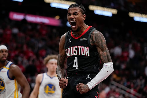 NBA Cup: Rockets guard Jalen Green celebrates after a dunk 