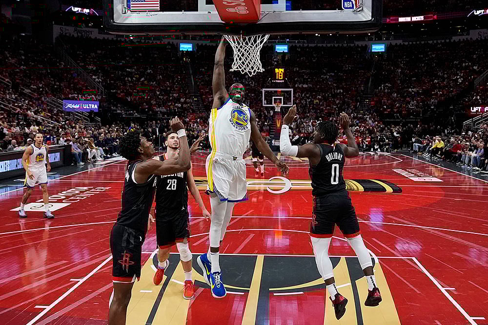 | Photo: AP/Ashley Landis : NBA Cup: Golden State Warriors forward Draymond Green (23) dunks