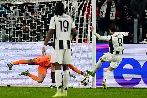 UEFA Champions League: Juventus' Dusan Vlahovic, right, scores his side's first goal