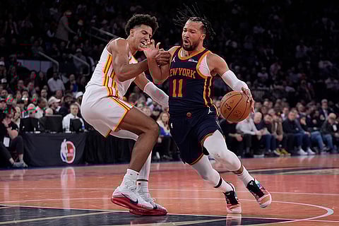 NBA Cup Quarter-Final: Hawks' Jalen Johnson (1) defends New York Knicks' Jalen Brunson