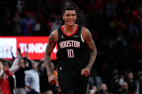 NBA Cup: Rockets forward Jabari Smith Jr. reacts after making a 3-pointer 