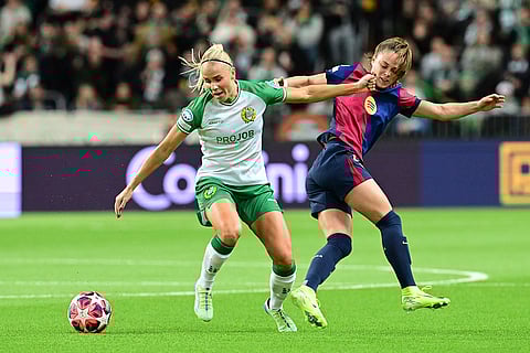 Women's Champions League: Hammarby's Stina Lennartsson, left, and Barcelona's Ewa Pajor